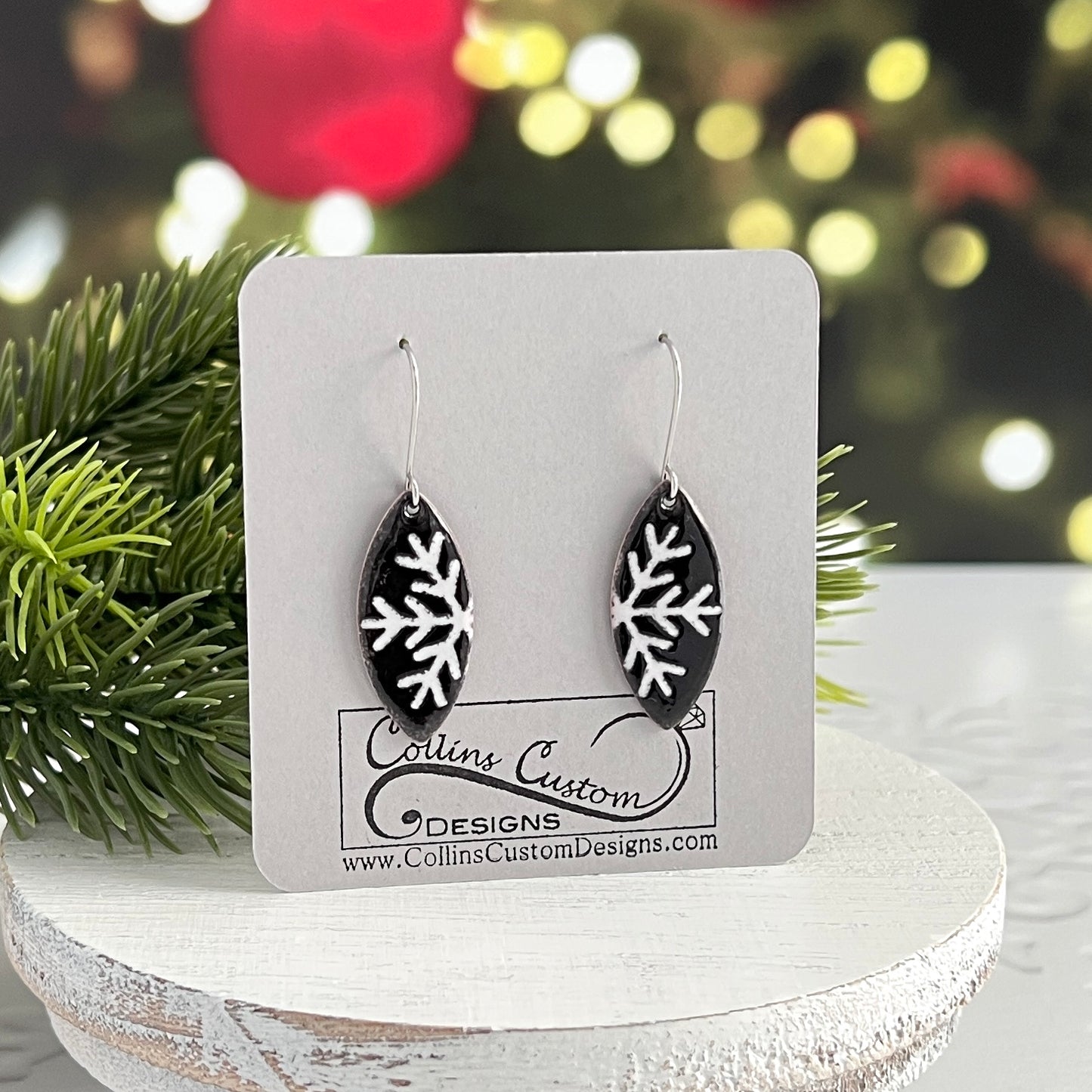 Black Enamel Marquise Earrings With White Partial Snowflakes