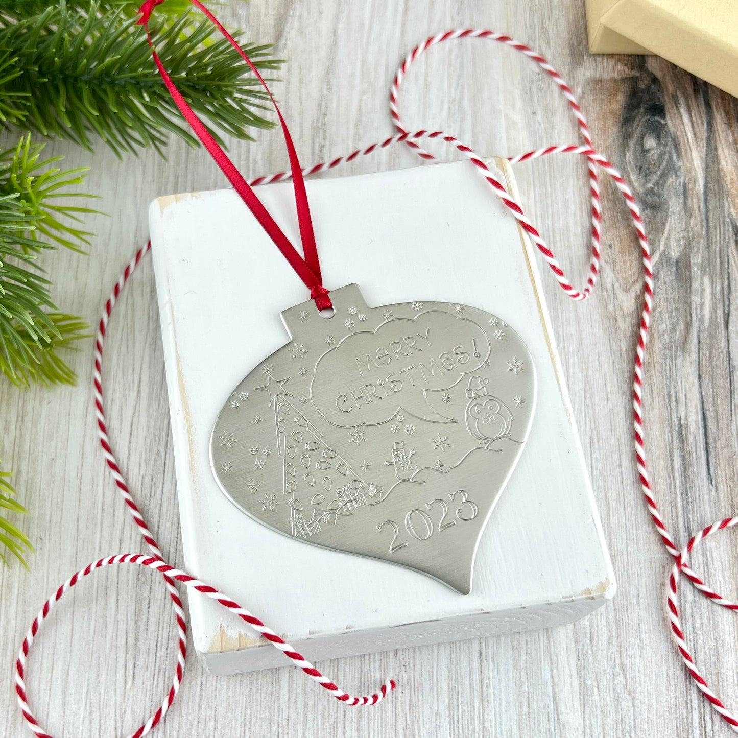 Wide Pointed Bulb Ornament With Hand Stamped Design