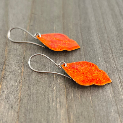 orange arabesque drop enamel earrings with stainless steel ear wires side view