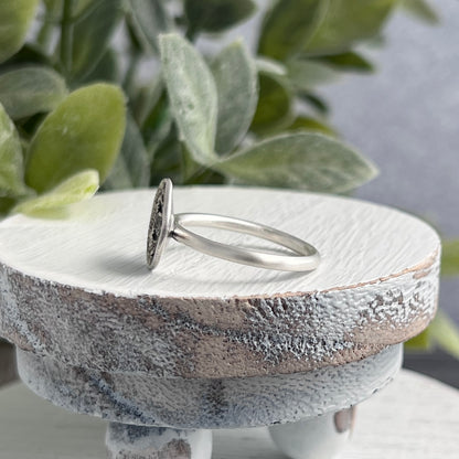Sterling Silver Ring with Small Concave Textured Round Top