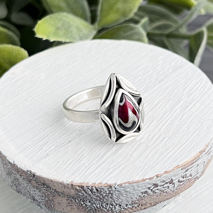 Sterling Silver Pear Shaped Fordite Ring with Decorative Frame