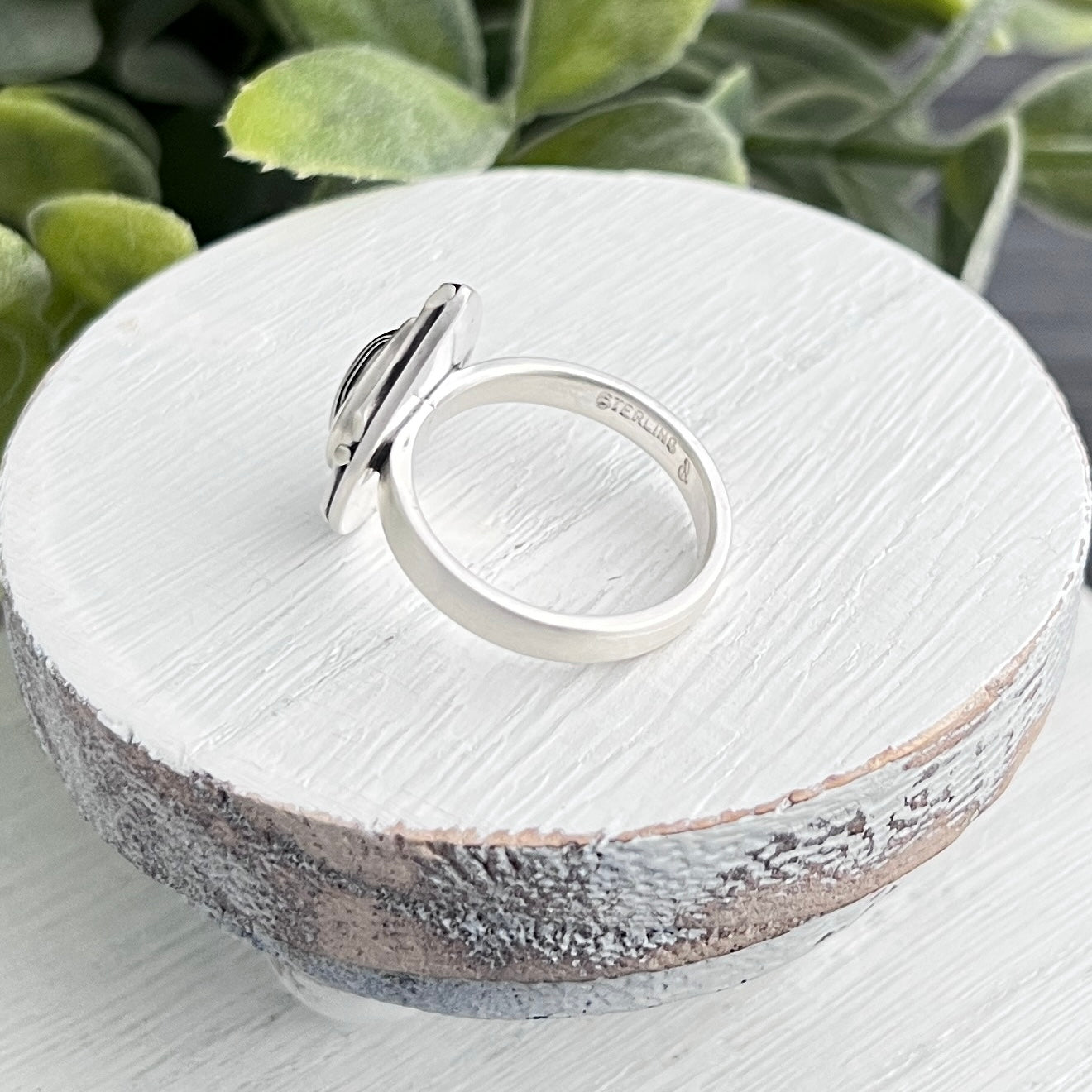 Sterling Silver Pear Shaped Fordite Ring with Decorative Frame