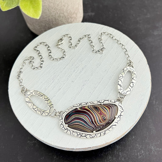 Fordite Necklace with Hand Stamped Centerpiece Links