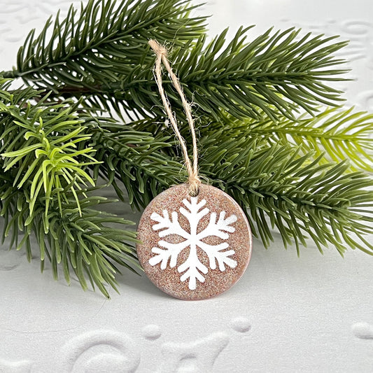Round Enamel Ornament With White Snowflake